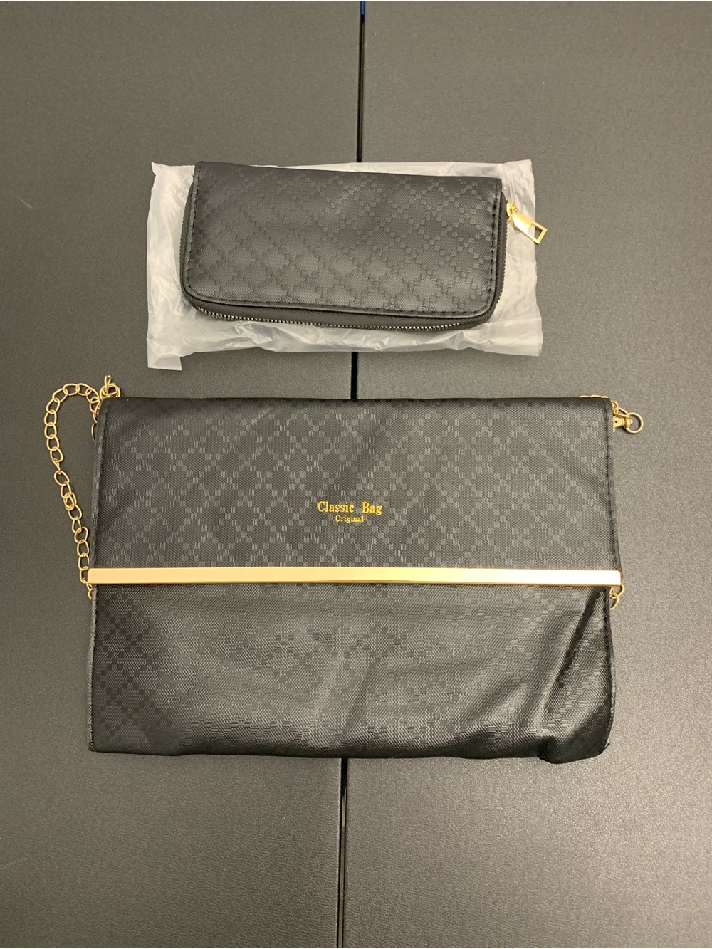 Classic Black Clutch with Gold Accent and Matching Wallet